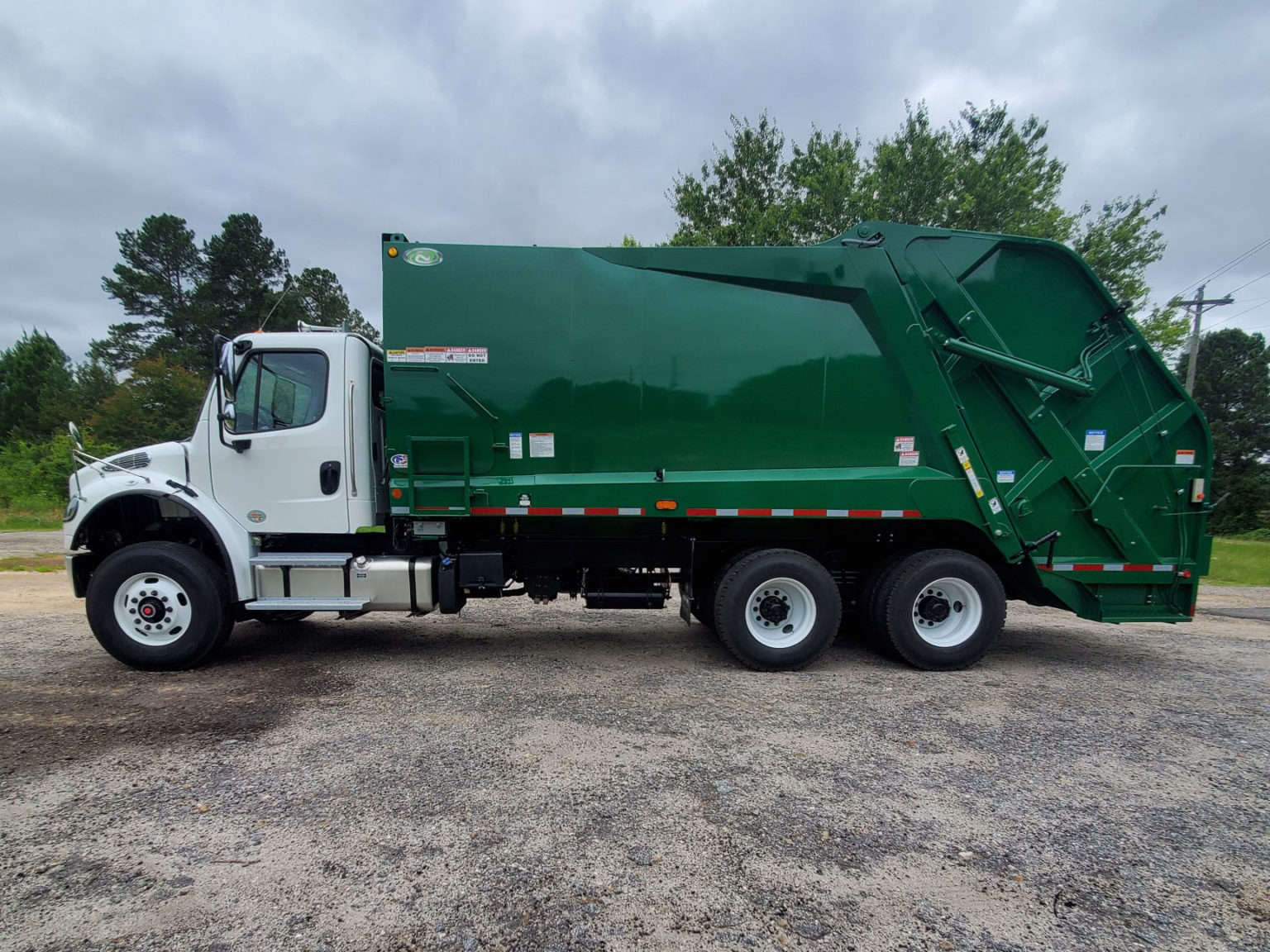 New Way® King Cobra™ Rear Loader - Solid Waste Applied Technologies Inc